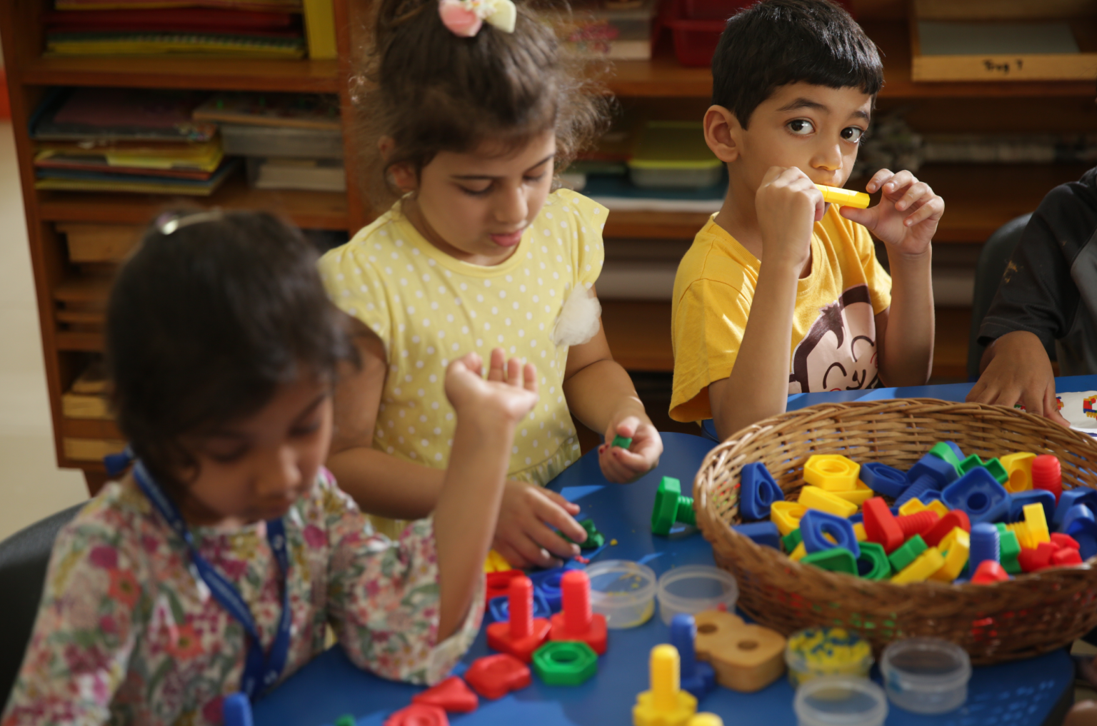 Children engaged in creative hands-on learning activities